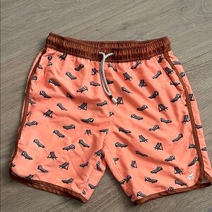 Kids Coral Swim Trunks with Lounge Chair Print